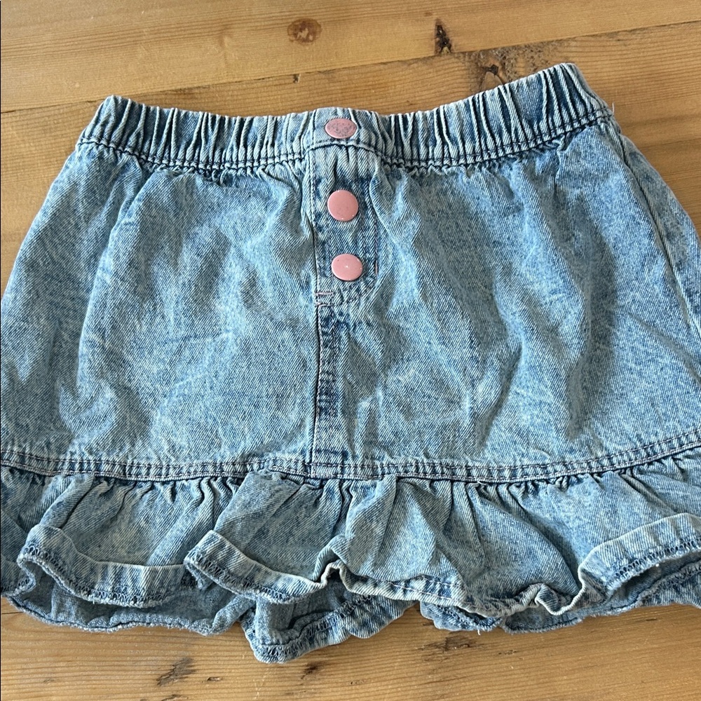 Girls Light Wash Denim Ruffle Mini Skirt with Pink Buttons